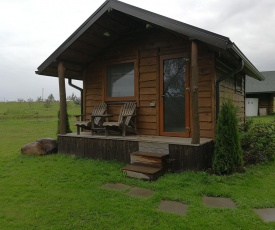 Iecupes wooden cabin with view to river